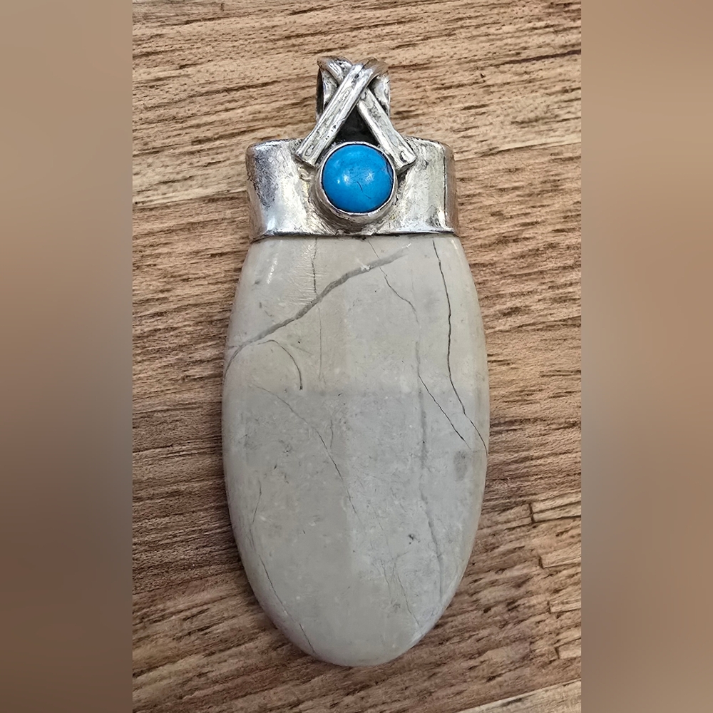 Vintage natural stone with turquoise piece